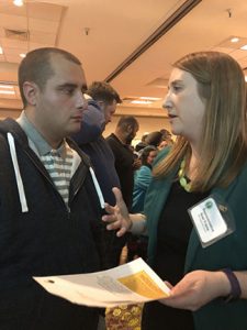 OLS Student talks with representative