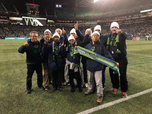 Issaquah Spirit Team celebrates at Seattle Sounders half time