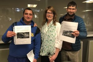 Students and Faculty show off their Career Hat projects at Share Night
