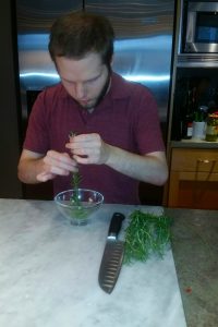 OLS Student cooks at Sizzleworks
