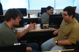 Students practice mock interviews in class