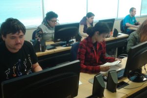 Group of OLS Students sitting at their desks reading in class