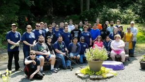 Large group of OLS Students posing for a group picture at Tavon Learning Center