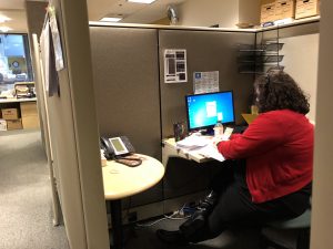 Raha working hard at her desk during her internship