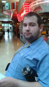 An OLS student works on a course project at the Crossroads Mall