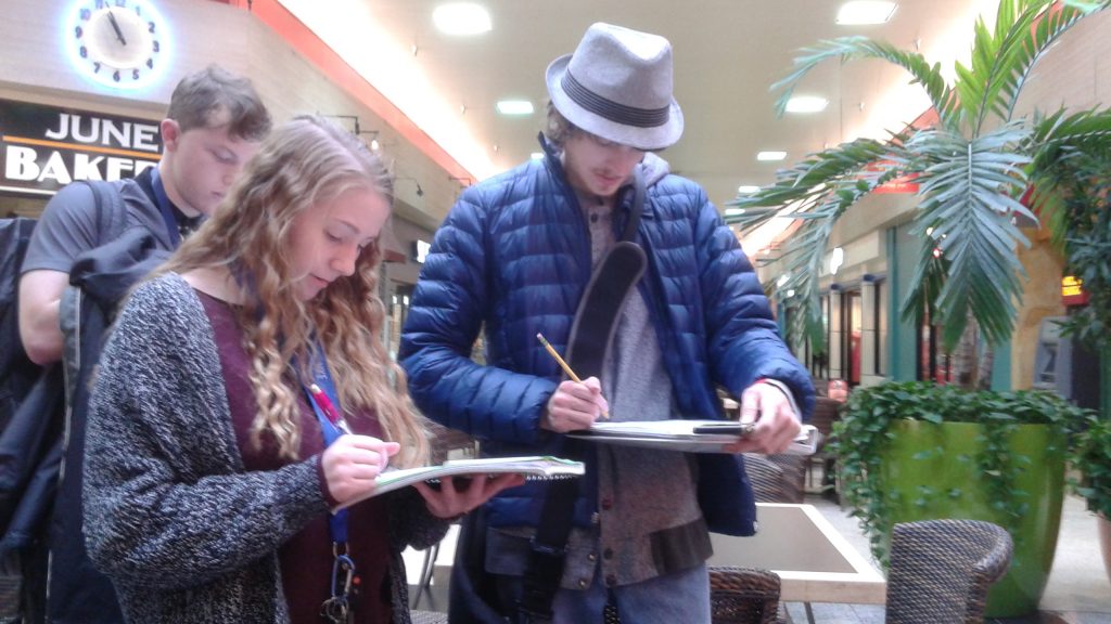 OLS Students working on a course project at Crossroads Mall