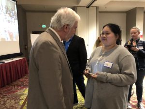 student talks with her legislator