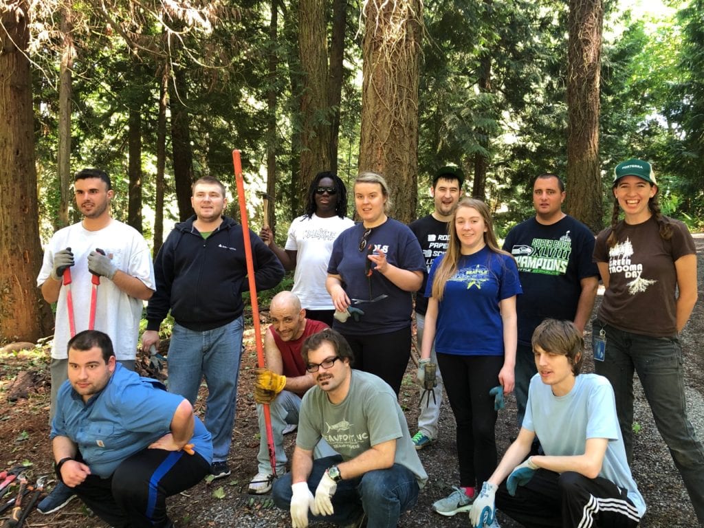 group of young adults in a forest