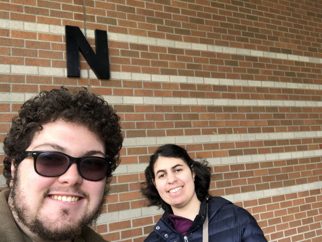 slefie of young man and young woman on college campus