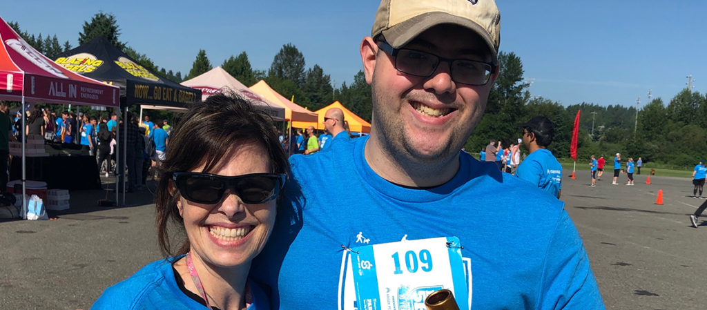 An OLS student with his mom at the Big Backyard 5K event. 