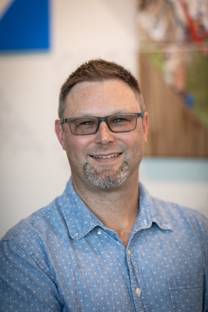 portrait of a middle-aged man with glasses, the new nstruction and Student Success Program Manager for OLS Bellevue College.