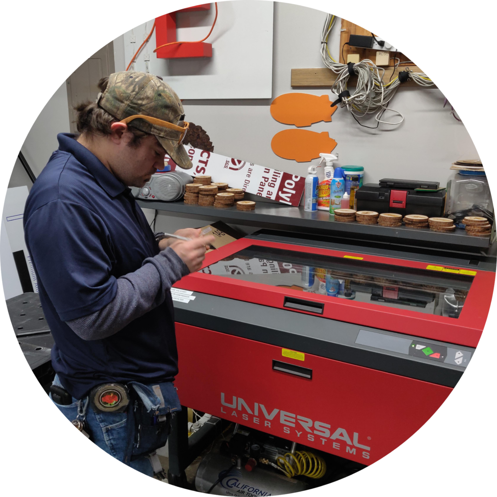 OLS Student prepares to use machinery for their OLS internship position