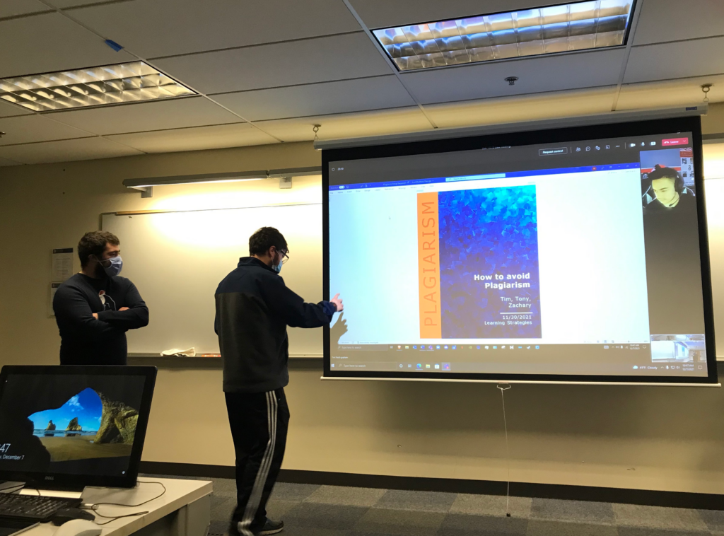 OLS students give a presentation in class