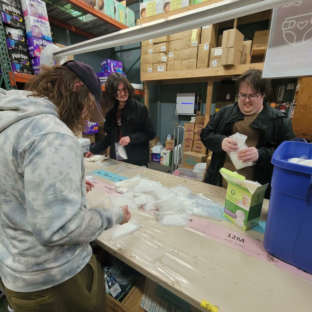 a group of OLS students volunteer at a charity organization