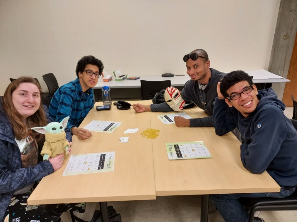 Four OLS students play an educational bingo game in class