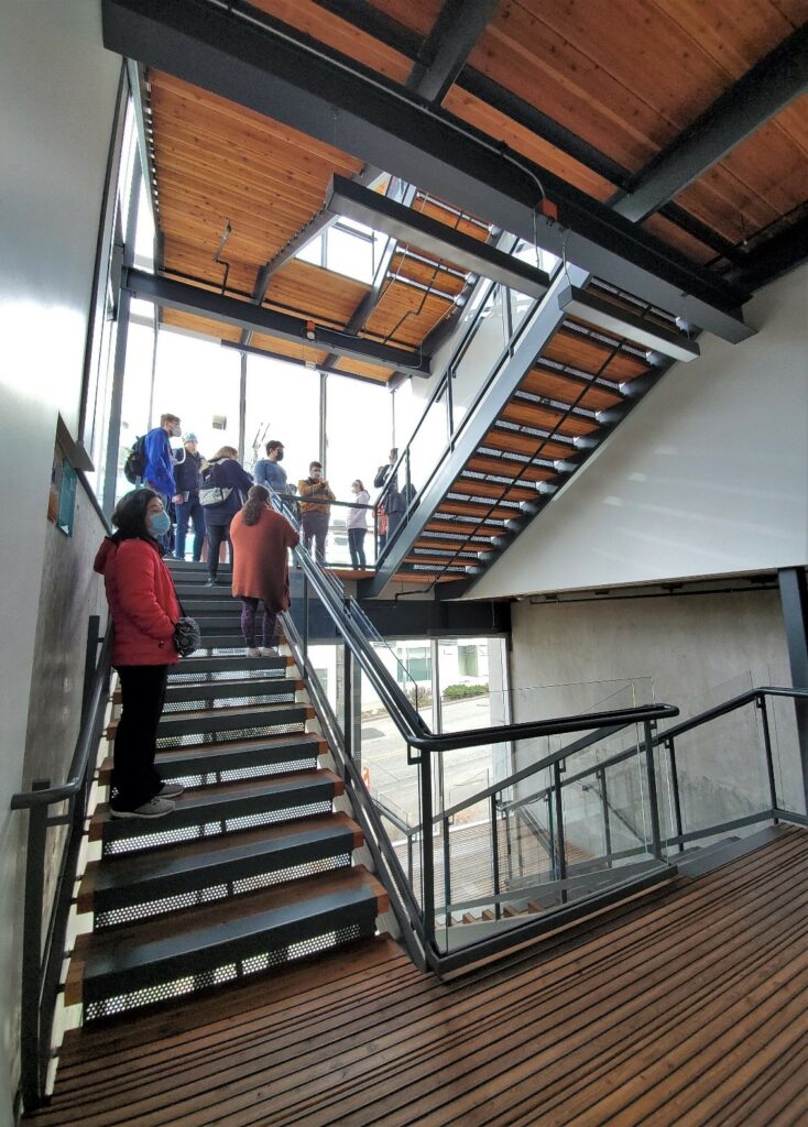 OLSBC students climb the irresistable staircase at the Bullit Center