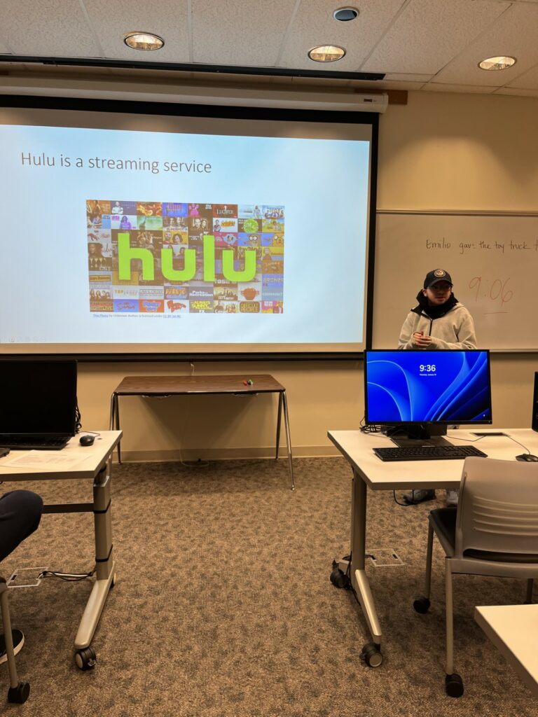 An OLS student presents in class