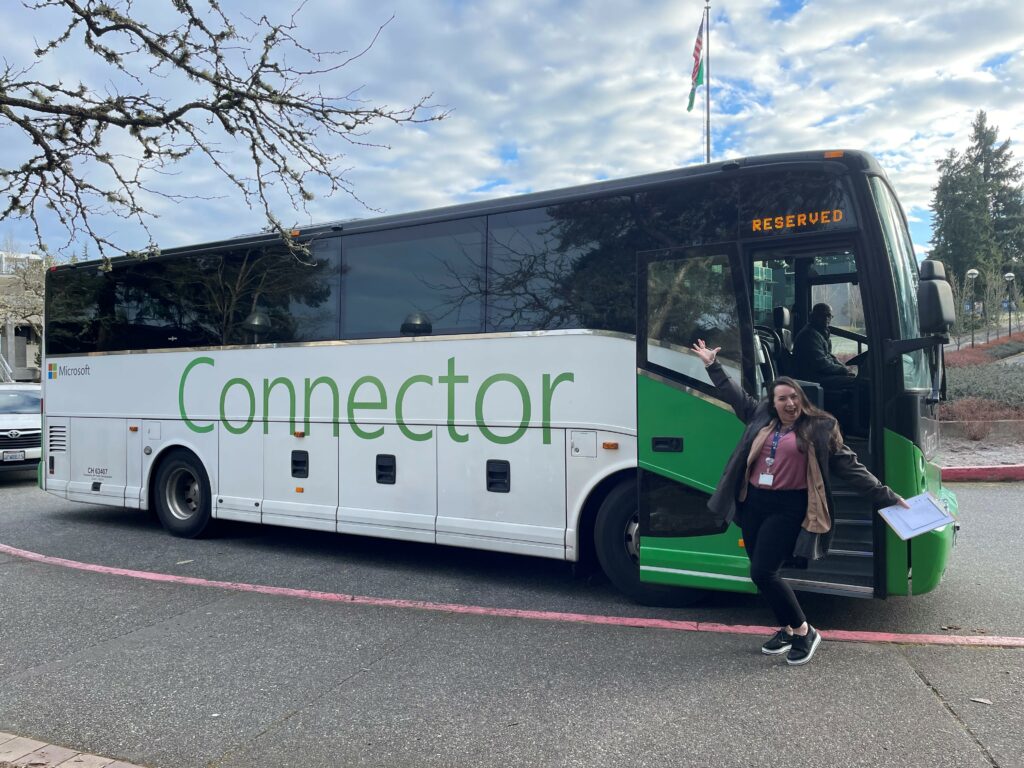 OLS Bellevue College instructor in front of the Microsoft bus