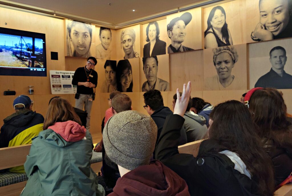 OLS Students listen to a presentation at the Bill & Melinda Gates Foundation exhibit