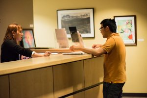 Student at CE front desk