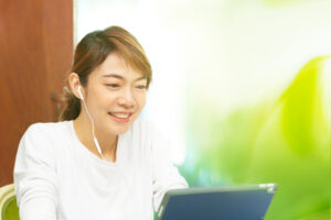 woman learning language online