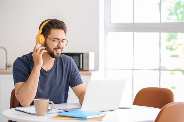 Male sitting in front of a computer