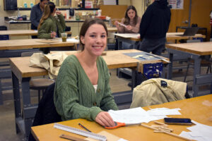 A student works in an Interior Design classroom.