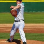 Picture of a Baseball Pitcher, mid pitch.