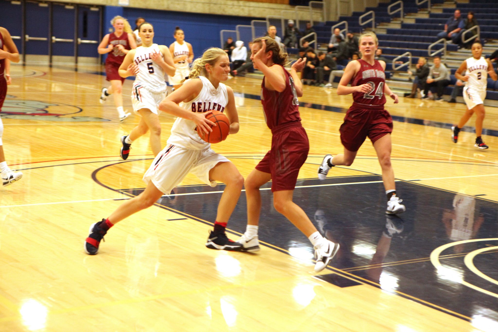 A BC player drives to the basket