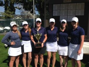 Bellevue women's golf holding the team trophy after winning the team title at the NWAC League Match at Avondale GC handily. 