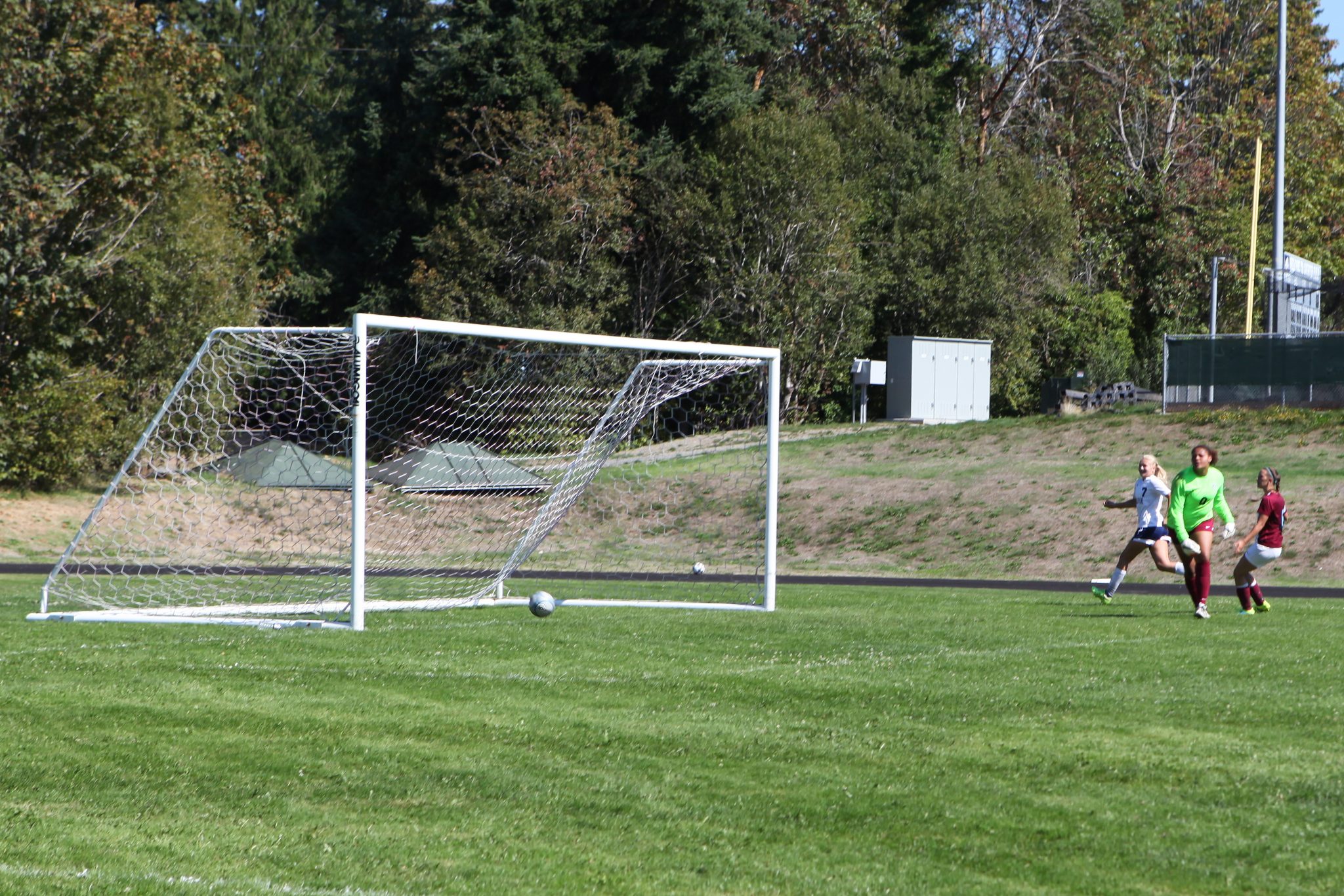 Image of a goal being scored by Bellevue College in a women's soccer match against Pierce College