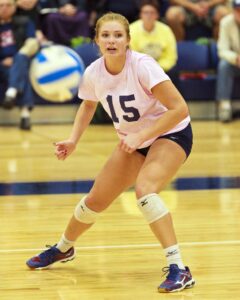 A Bellevue College volleyball player keeps her eye on the ball