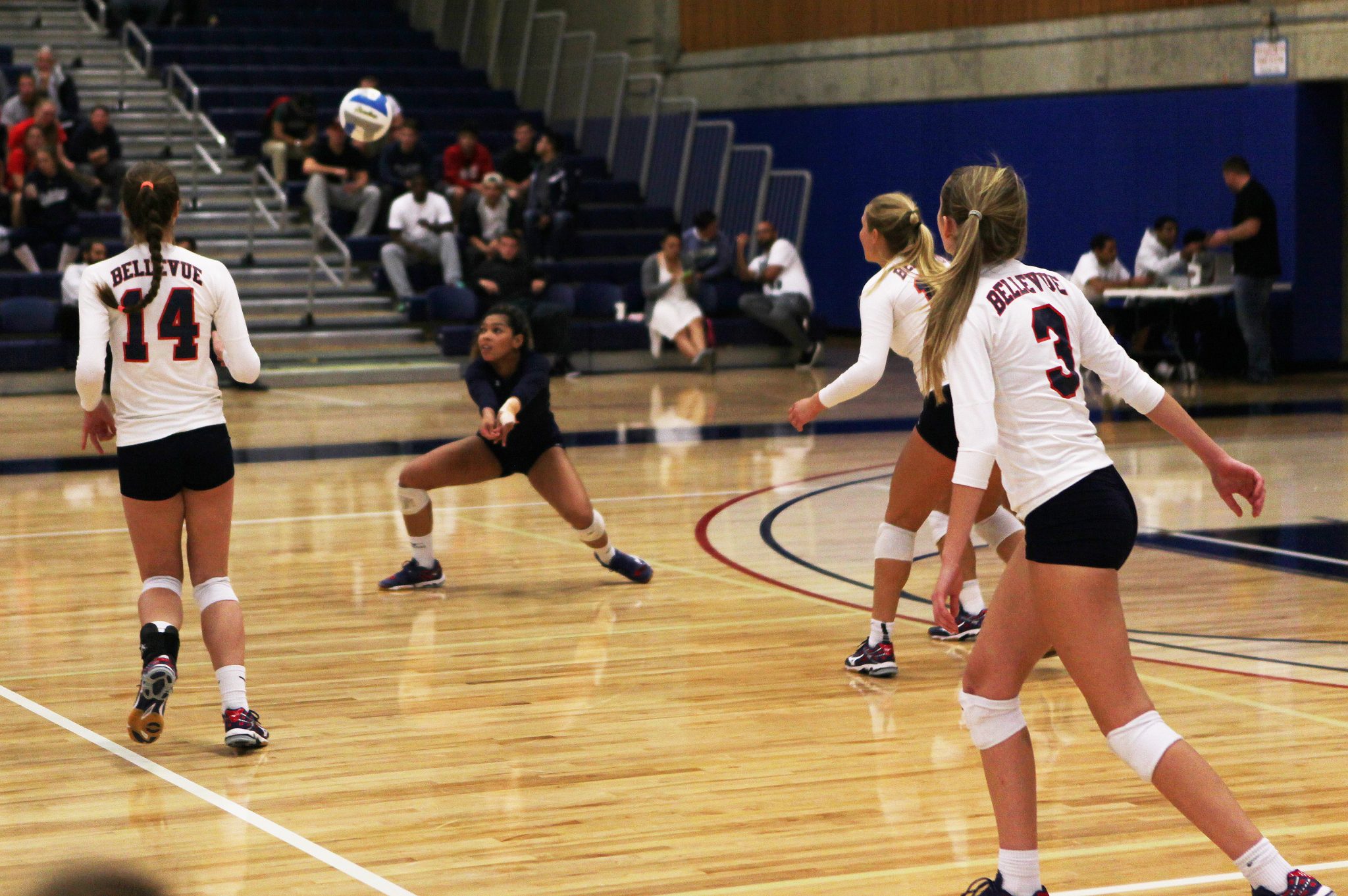 A Bellevue College player returns a shot against Edmonds