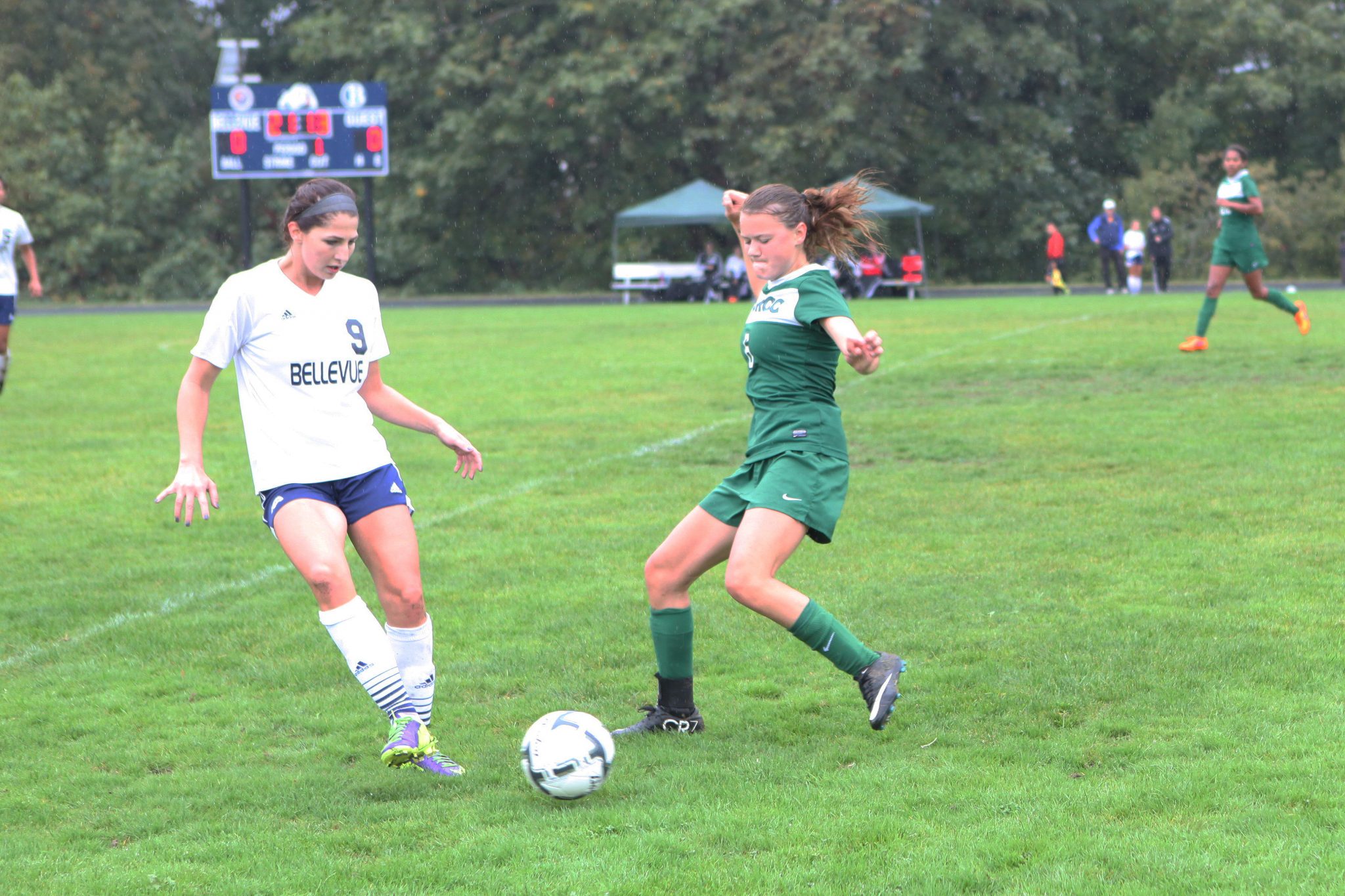 A Belleve Colllege player advances the ball against Green River in a women's soccer match