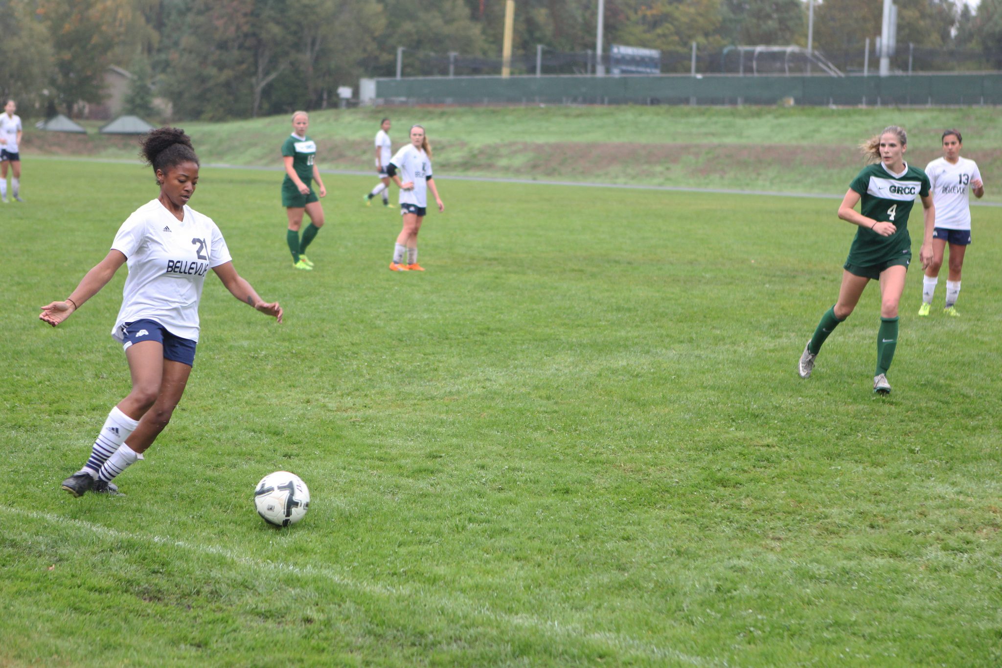 A Belleve Colllege player advances the ball against Green River in a women's soccer match