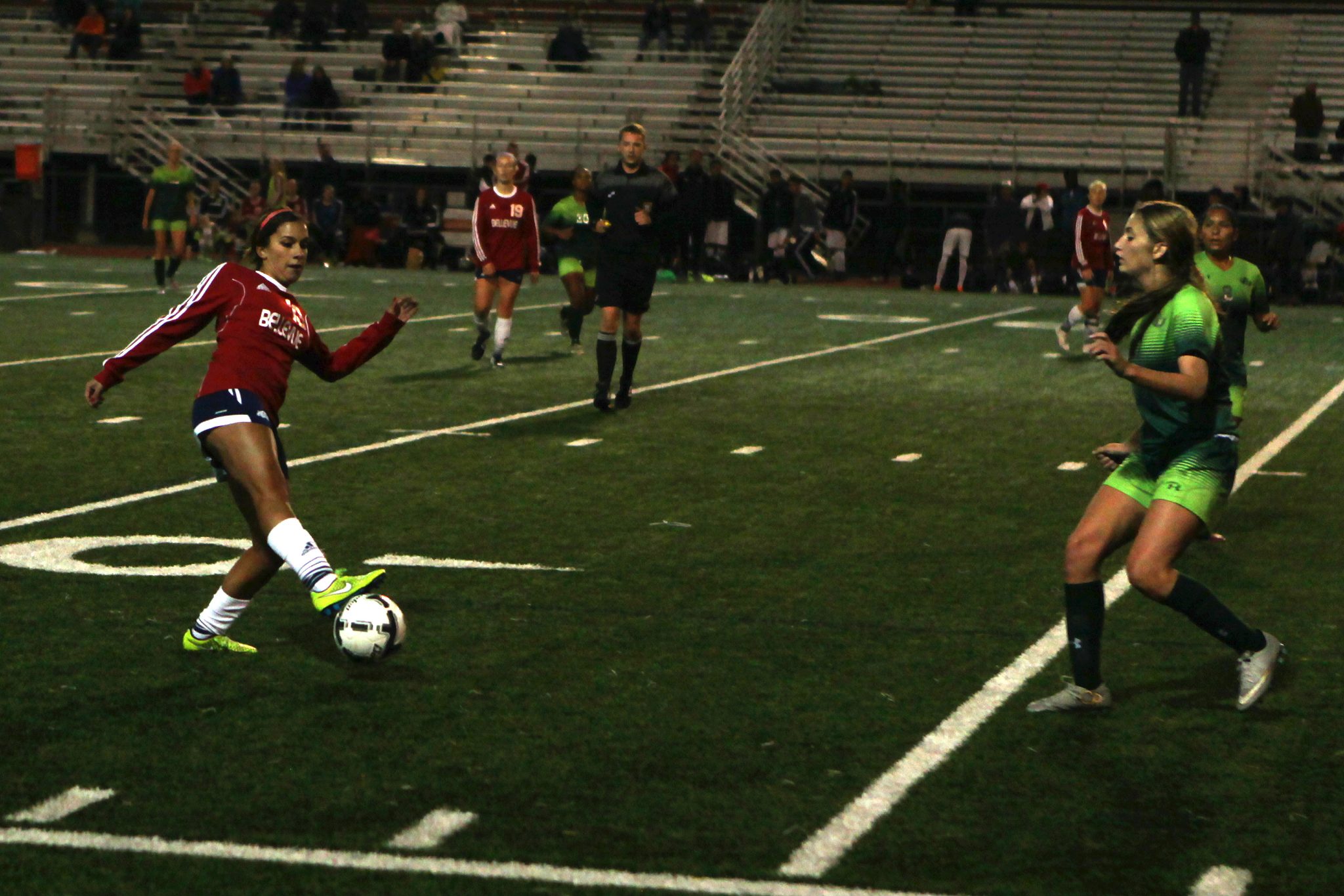 A Belleve Colllege player controls the ball against Highline in a women's soccer match