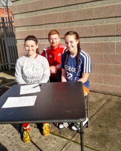 Jenna Poland and Kristen England sign for Bellevue