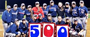 BC Softball Team with sign for coach Frances 500th victory