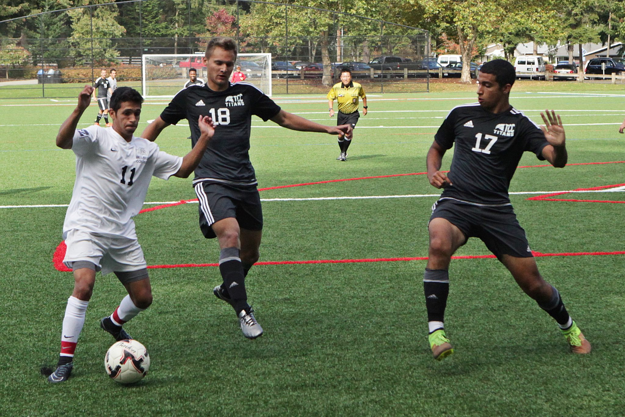 A BC men's soccer player kicks the ball vs. Tacoma