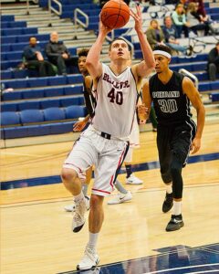 Max Tilden had a team-best 12 points and 12 rebounds in the tough loss to Peninsula. photo by Rich Dworkis.