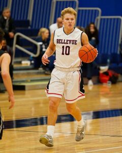 BC basketball player Jaden Vollmen dribbles the ball