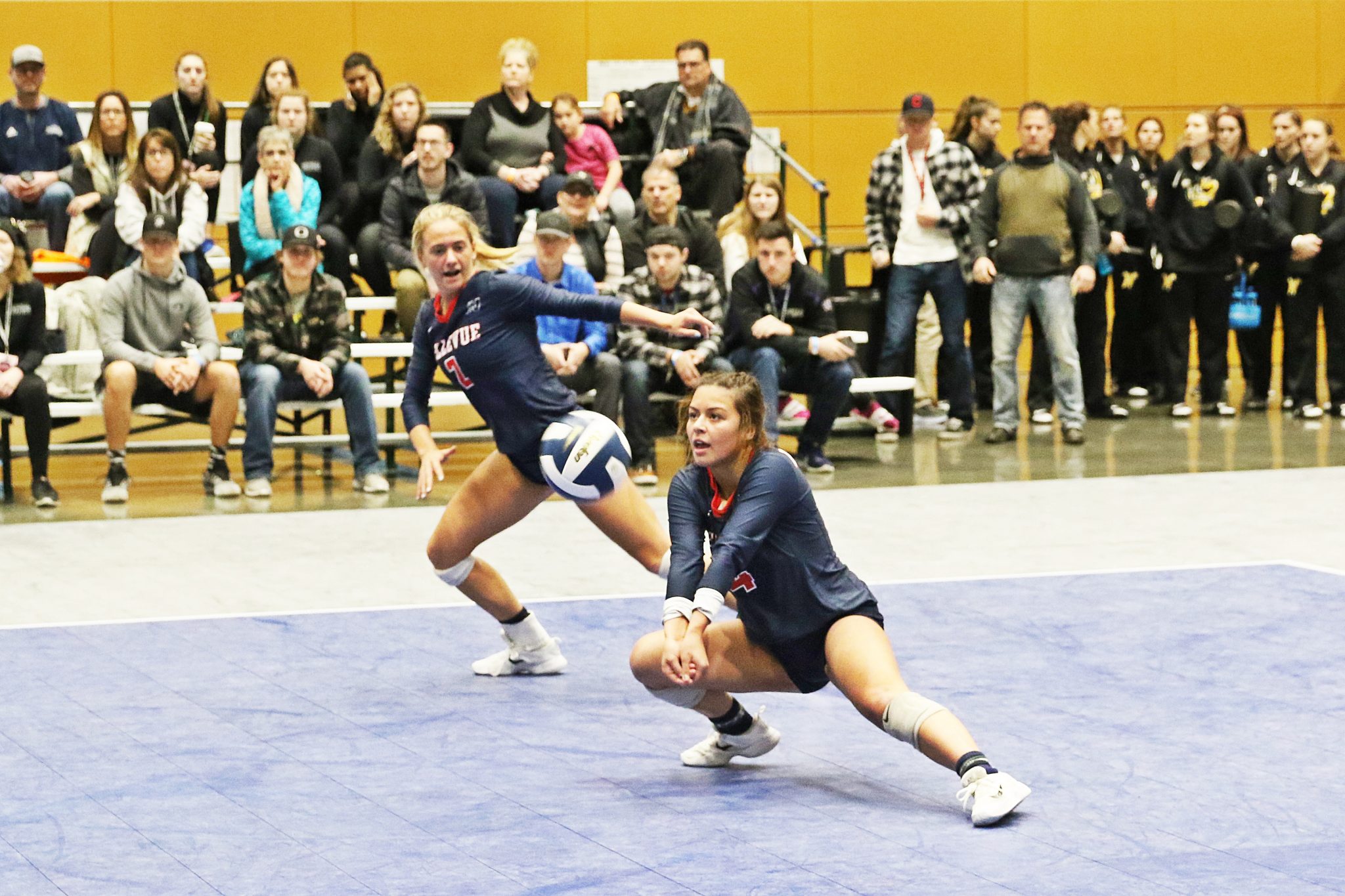 A BC player digs out a ball