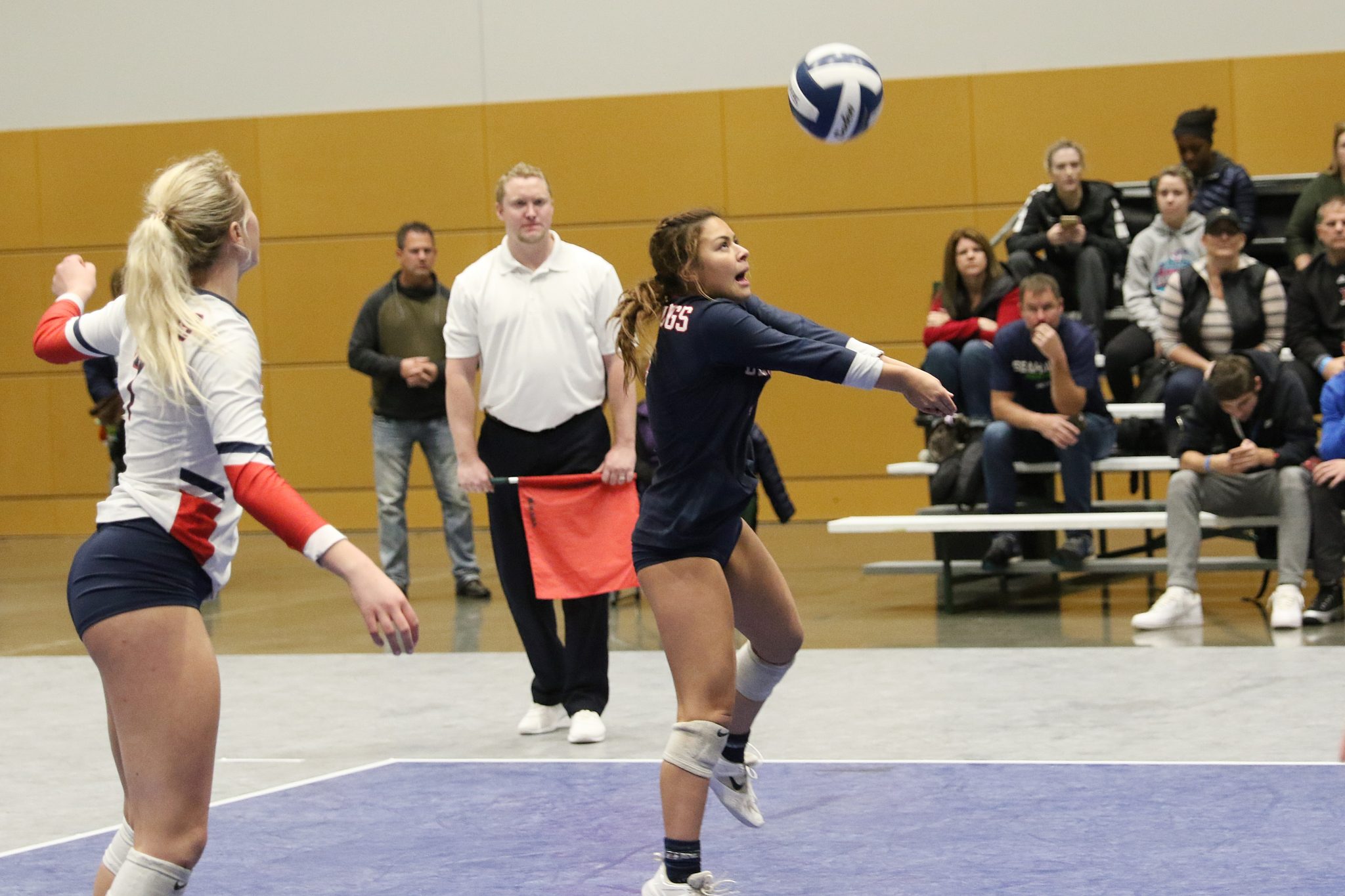 A BC player bump passes the ball
