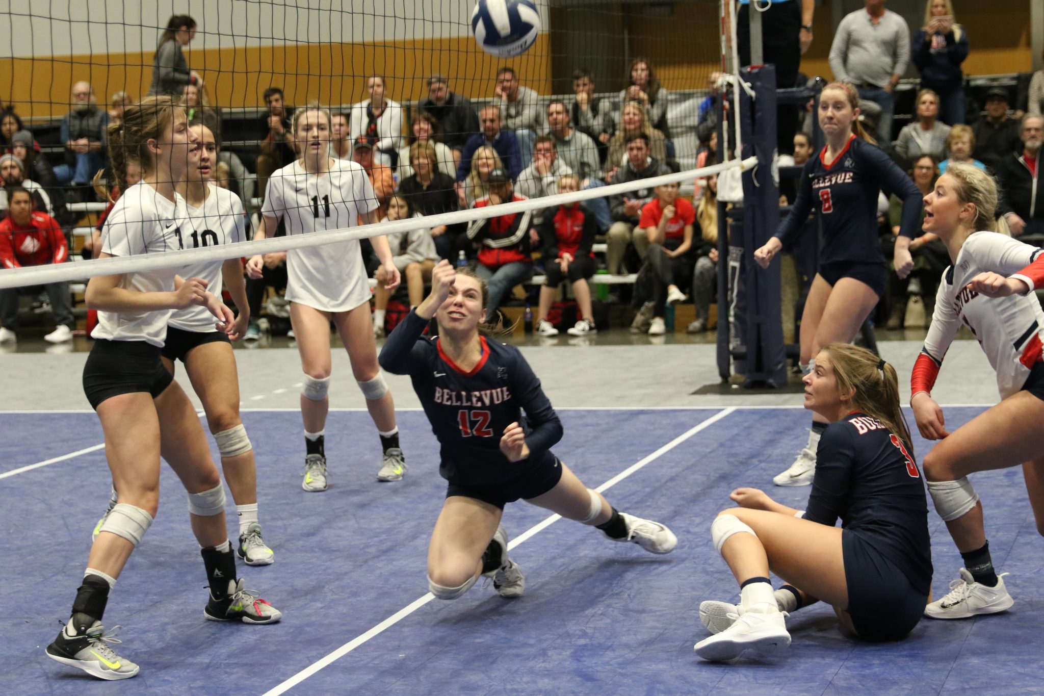A BC player makes a one-handed dig