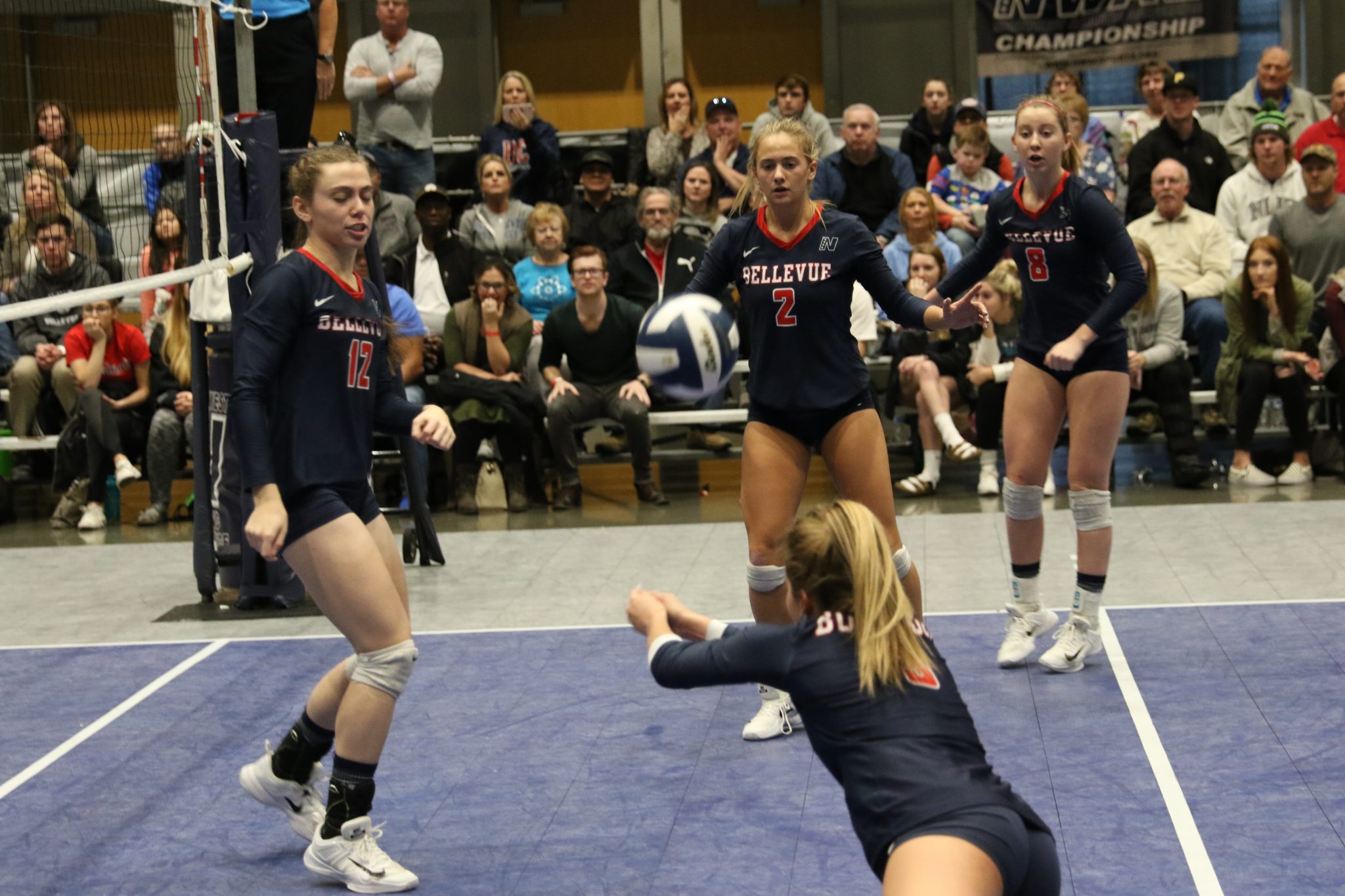 A BC player digs the ball out