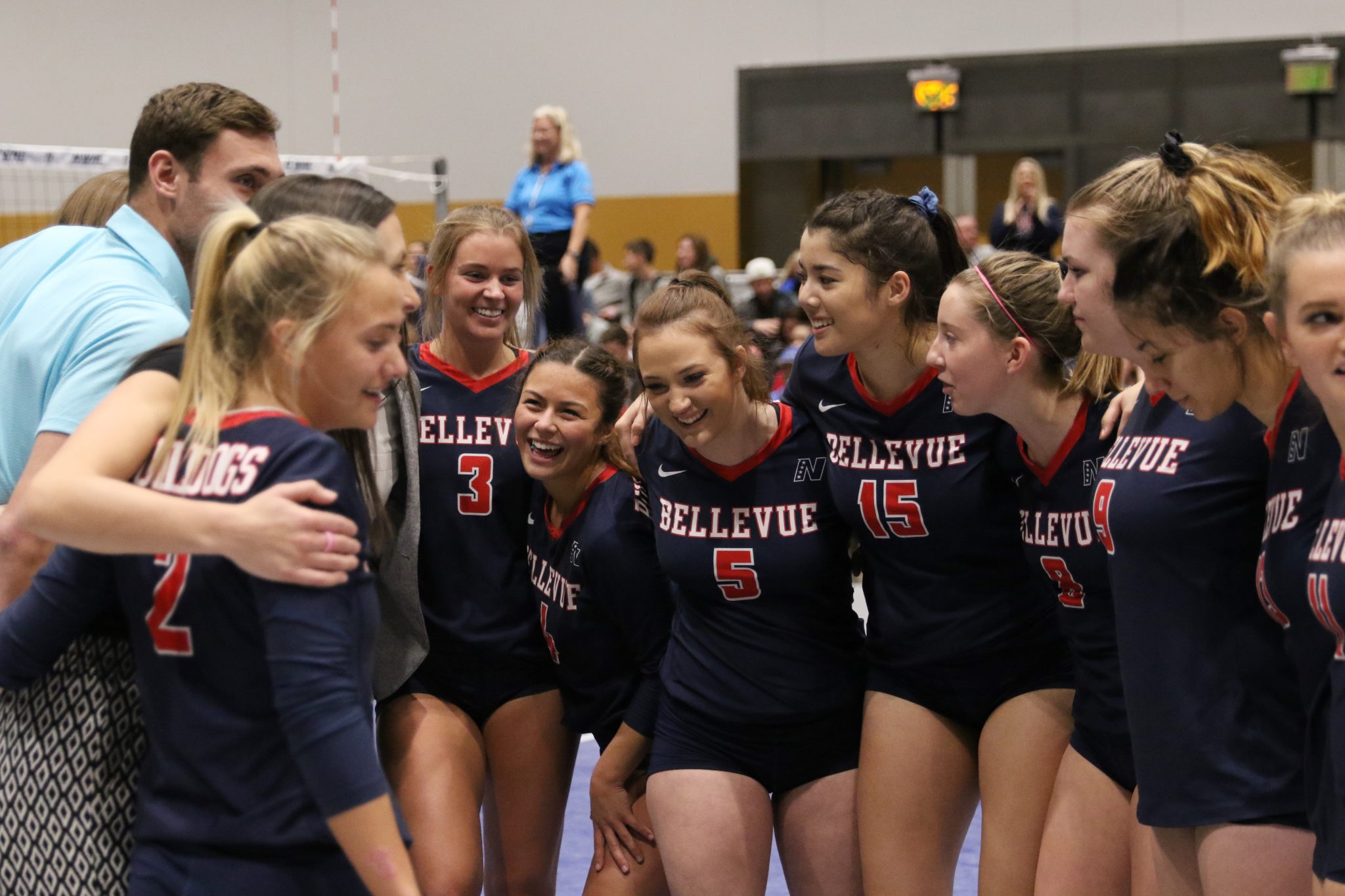 A group of BC players with their arms around each other