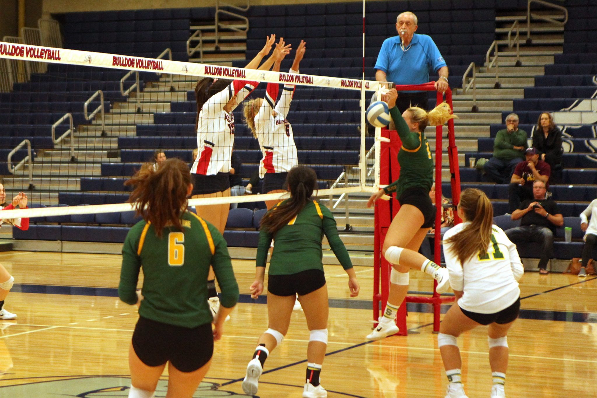Two BC players go up for a block