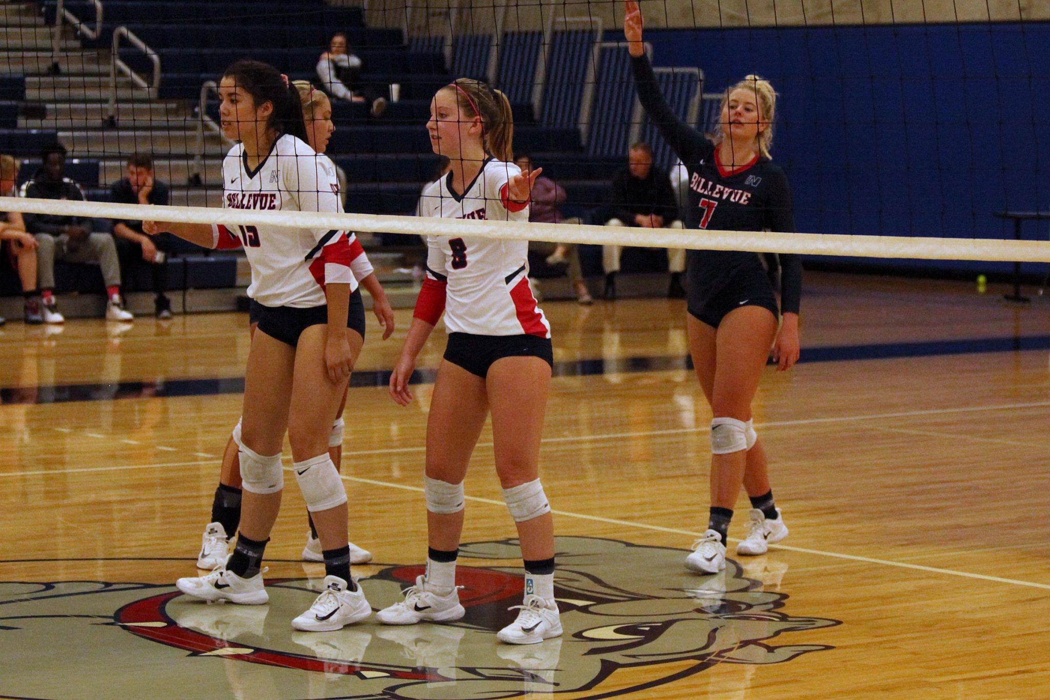 BC players get ready to receive the serve