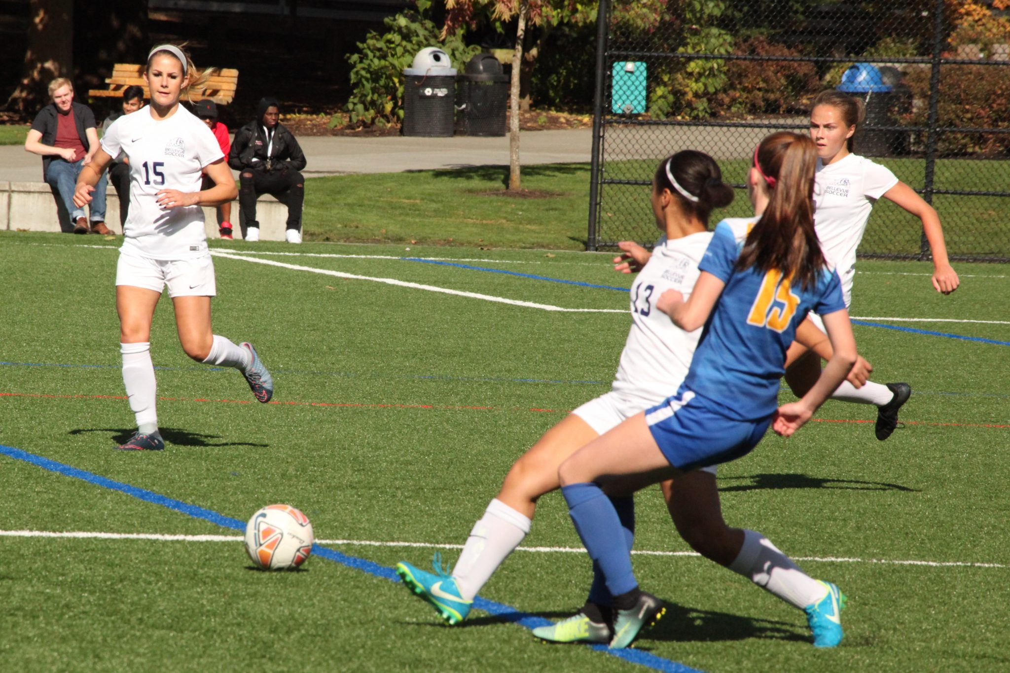 A BC player passes the ball to a teammate