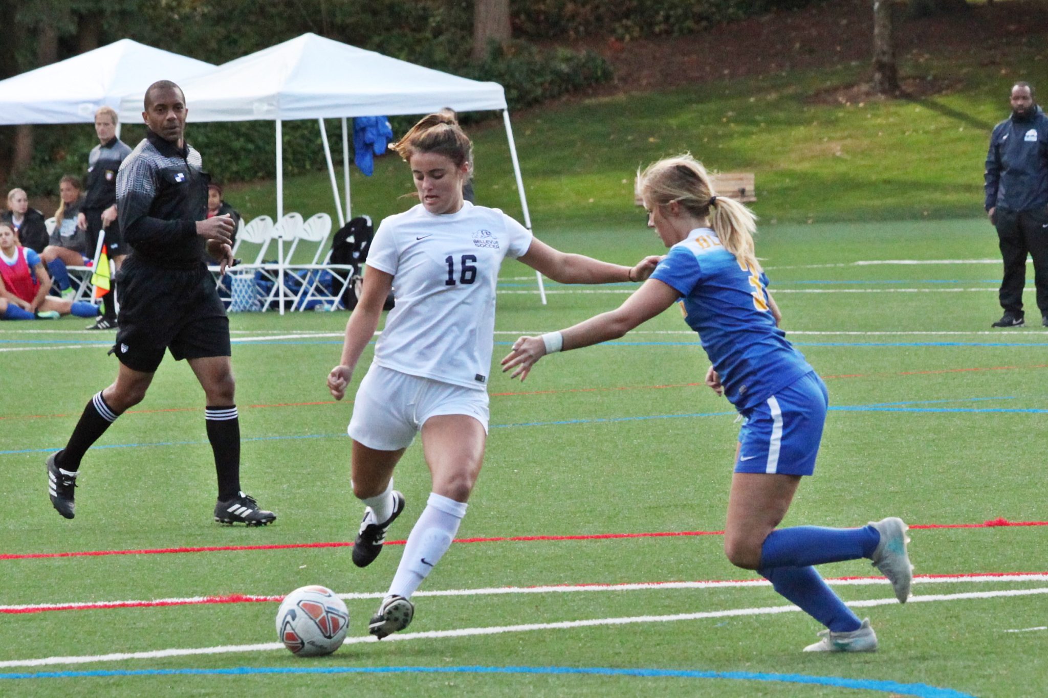 A BC player kicks the ball